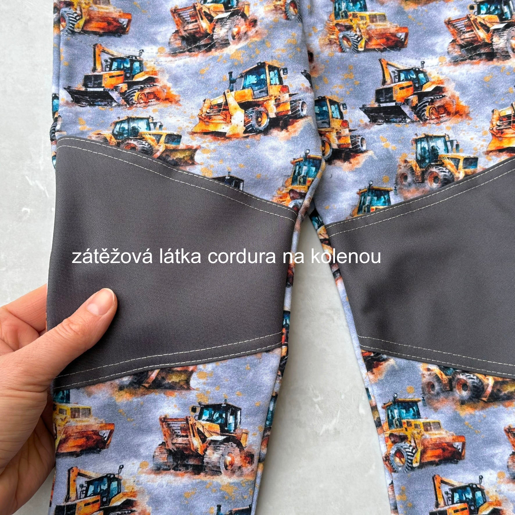 Tepláky šedé s bagry