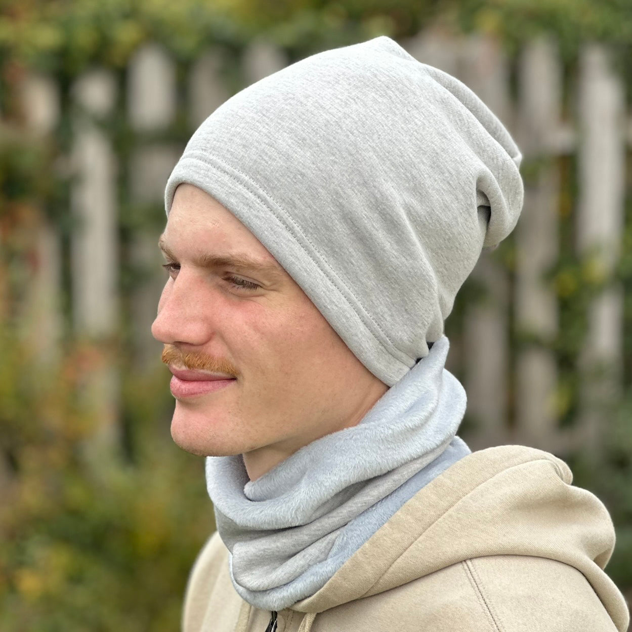 Zimní nákrčník světle šedý melír