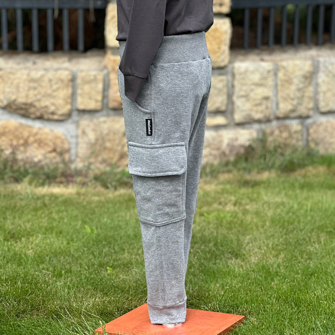 Tepláky kapsáče šedý melír