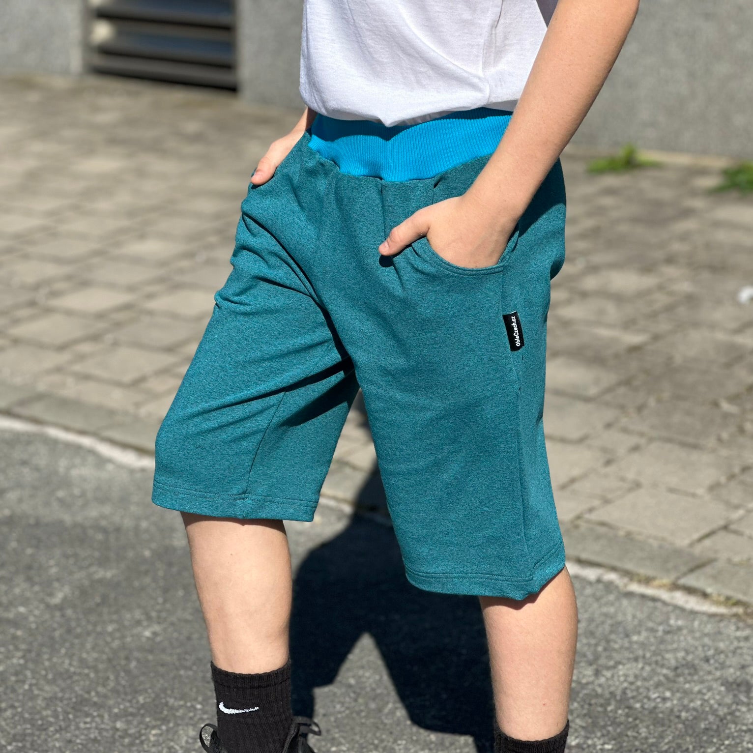 Kraťasy tyrkysové šedý melír