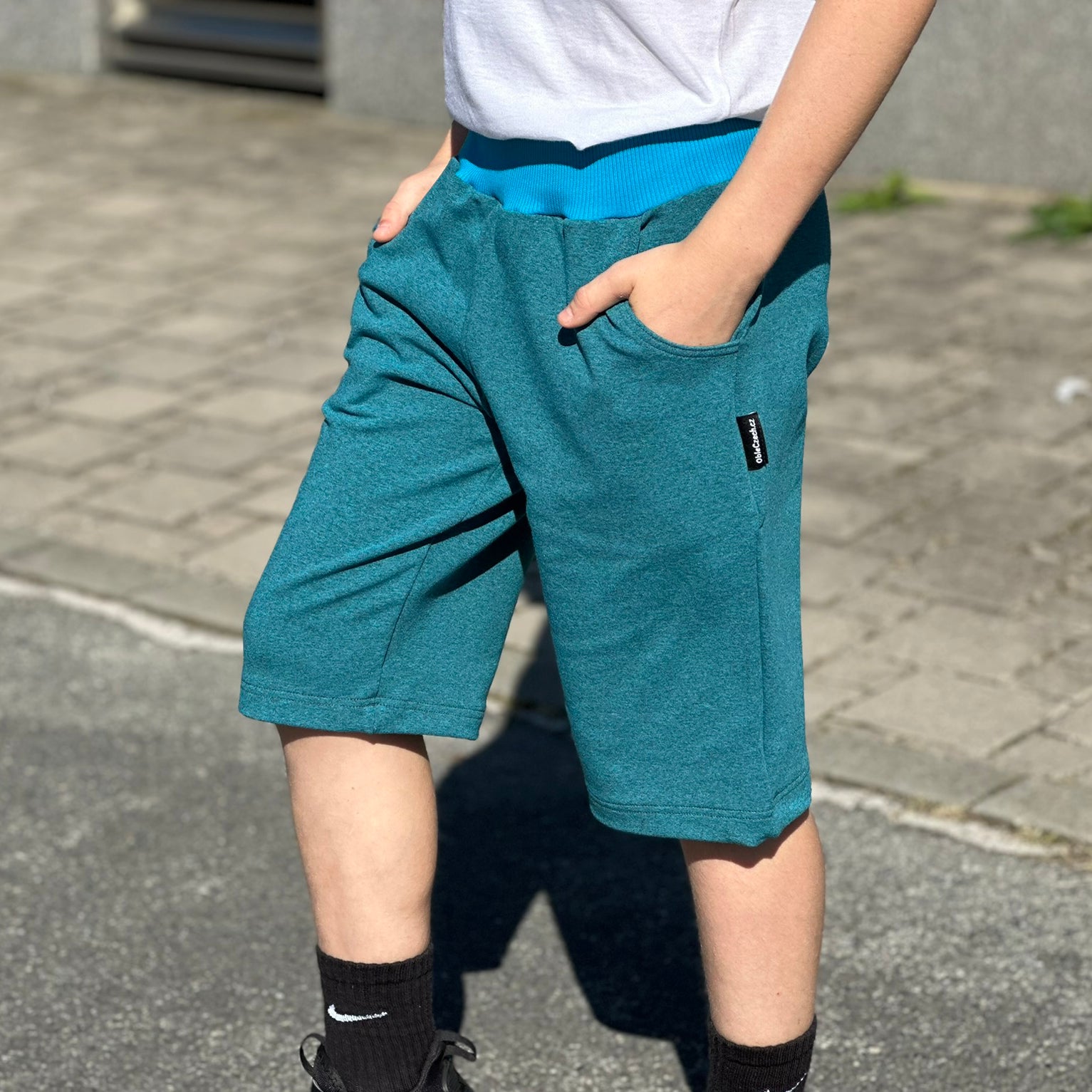Kraťasy tyrkysové šedý melír
